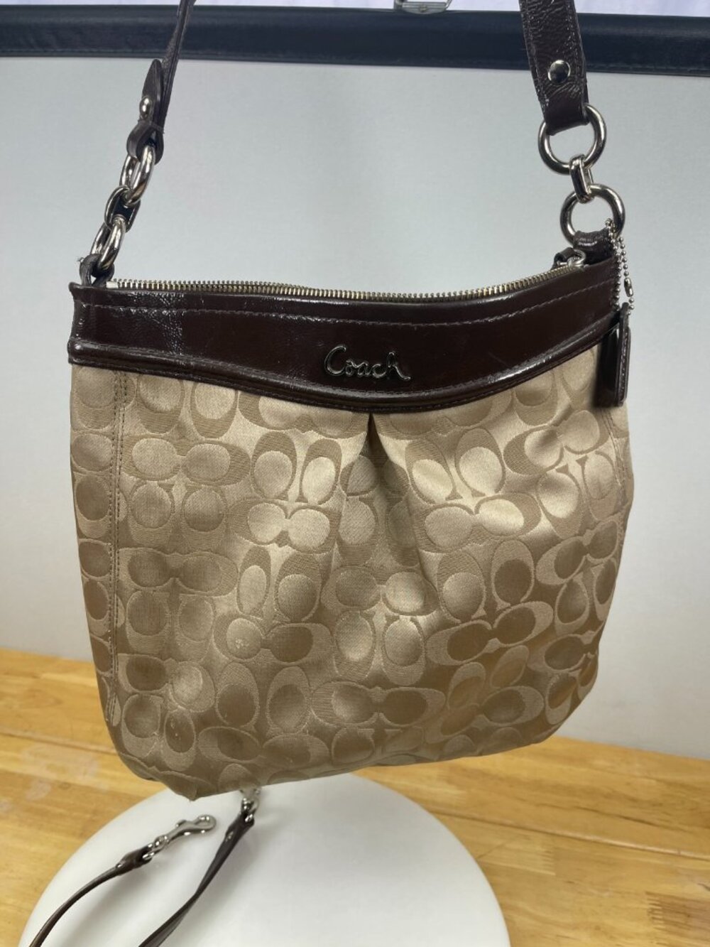 Classic older-era Coach Signature hobo bag featuring jacquard canvas and patent